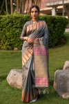 Gray color pure tussar silk saree with ikat woven border