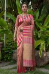 Pink color pure tussar silk saree with ikat woven border