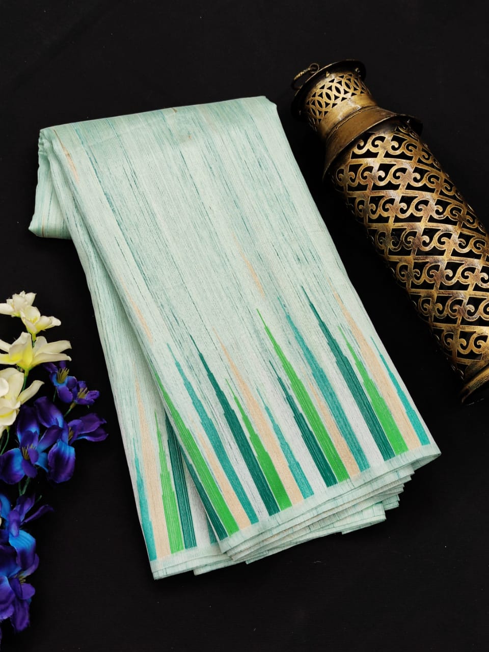 Sea green color tussar silk weaving saree with ikat woven border