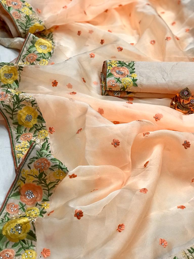 Peach color organza silk saree with embroidery work
