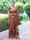 Maroon color patola silk saree zari withweaving work
