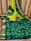 Parrot green and dark green color hand bandhej bandhani silk saree with zari weaving work