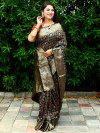 Black color patola silk saree with gold zari weaving work
