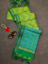 Mahendi green color tussar silk saree with zari woven work