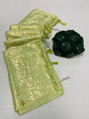 Pista green color soft dola silk saree with foil printed work