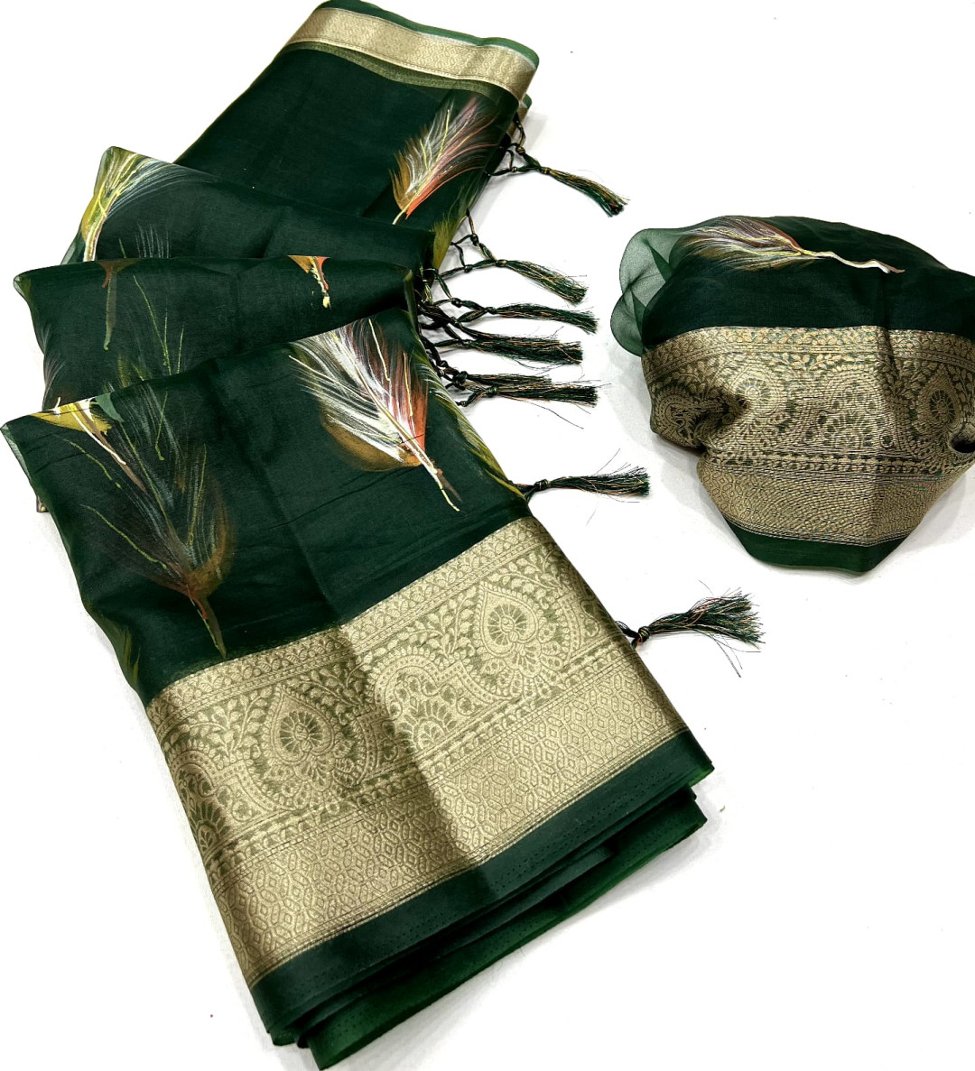 Dark green color soft organza silk saree with foil printed work