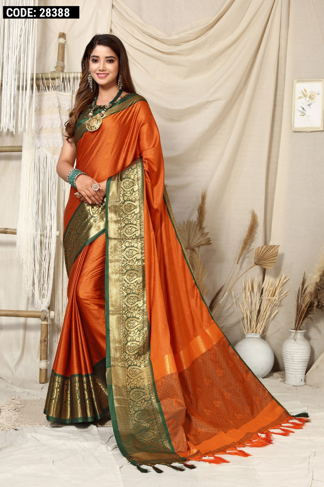 Orange color soft cotton silk saree with woven design