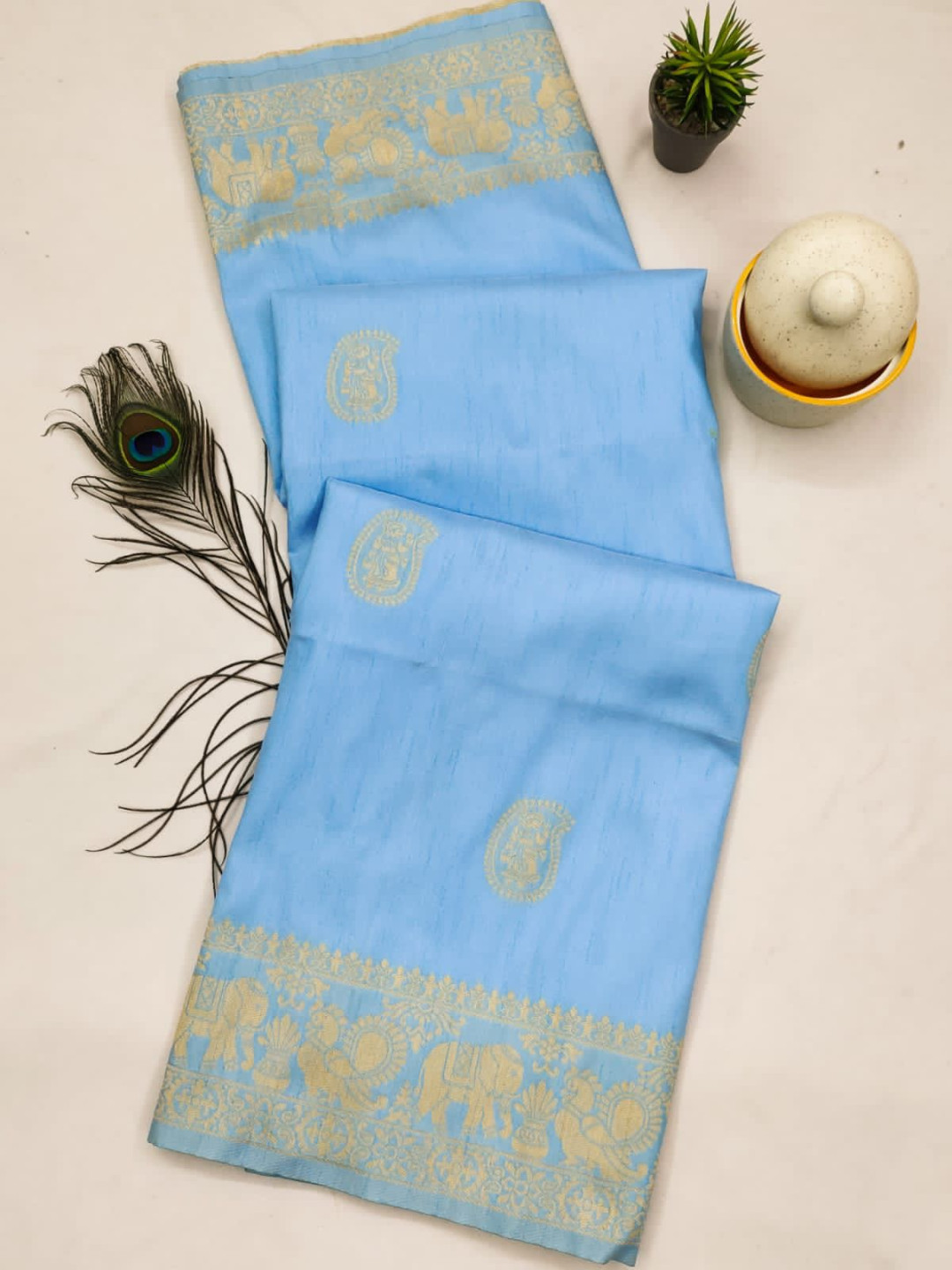 Sky blue and baby pink color soft raw silk saree with woven design