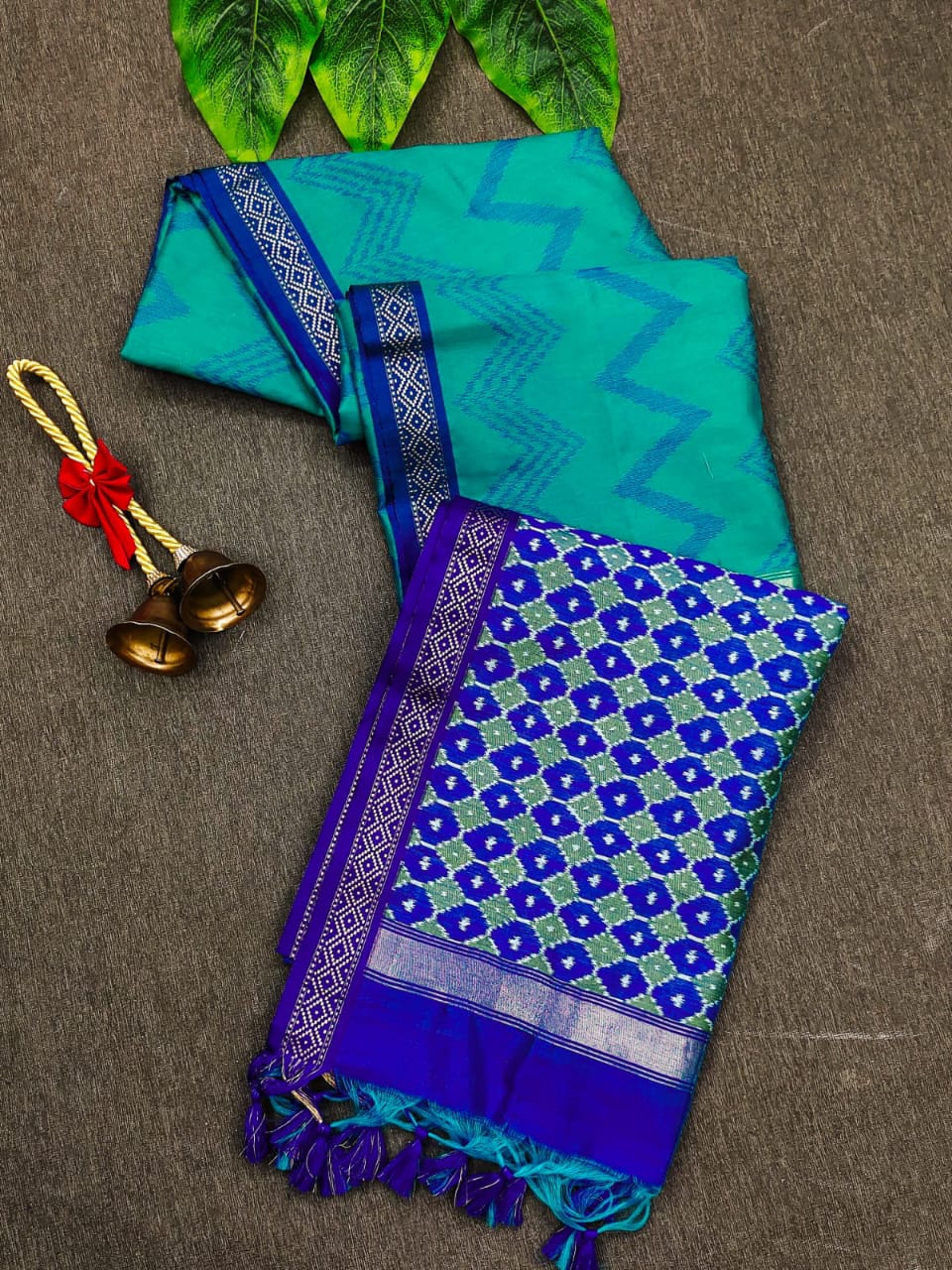 Rama green color tussar silk saree with zari woven work