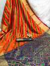 Orange color banarasi patola silk saree with weaving work