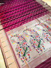 Magenta color paithani silk saree with weaving work