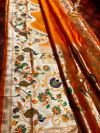 Orange color paithani silk saree with pure golden zari weaving work