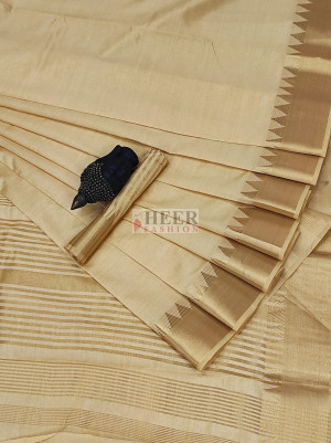 beige color soft assam silk saree with golden zari weaving work