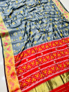 Gray color patola silk saree with golden zari weaving work