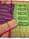 Magenta color kanchipuram silk saree with golden zari weving work