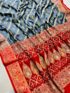 Gray color bandhani silk saree with zari weaving work