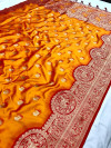 Mustard yellow color banarasi silk saree with golden zari weaving work