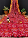 Red color bandhani silk saree with khadi printed work