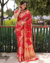 Red color pure hand bandhej silk saree with zari weaving work