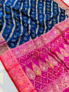 Navy blue color bandhani silk saree with zari weaving work