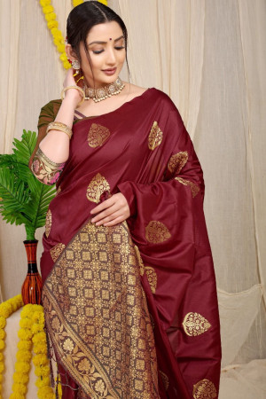 Maroon color soft banarasi silk saree with golden zari weaving work