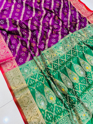 Magenta color bandhani silk saree with zari weaving work