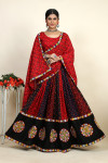 Red color cotton rayon navratri lehenga choli in embroidered and printed work