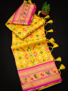 Yellow color patola silk saree with zari weaving work