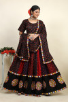 Black color cotton rayon navratri lehenga choli in embroidered and printed work