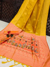Yellow and peach color soft handloom raw silk saree with woven design