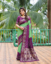 Green and magenta color hand bandhej silk saree with zari weaving work