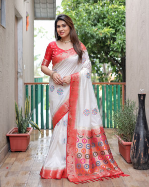White color dola silk saree with zari weaving work