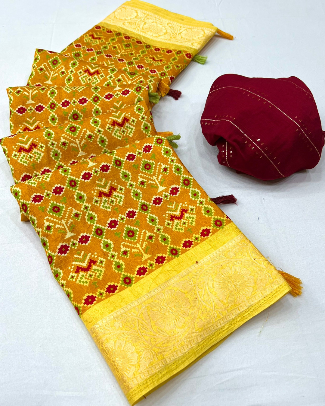 Yellow color dola silk saree with printed work