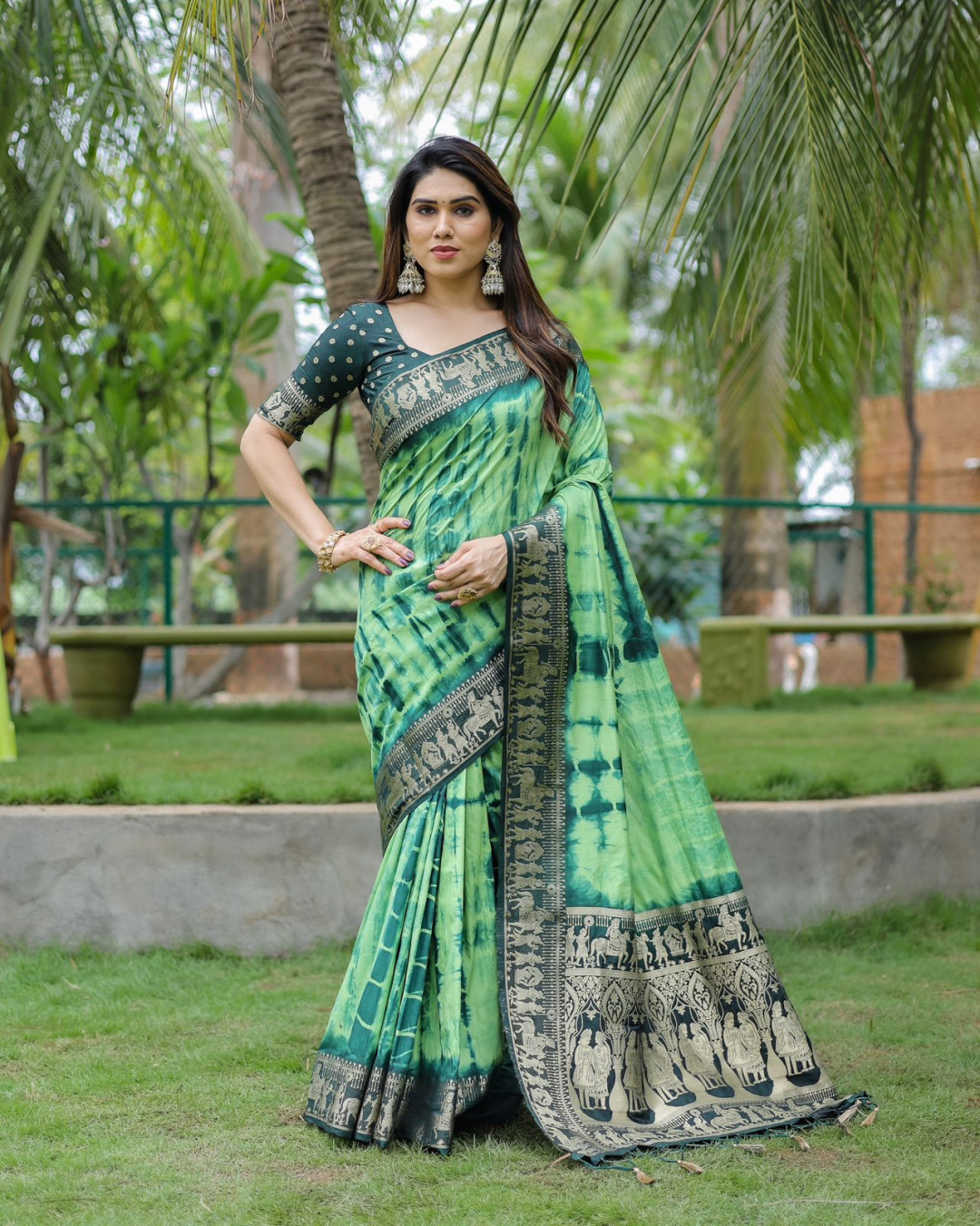 Parrot green color dola silk saree with zari weaving work