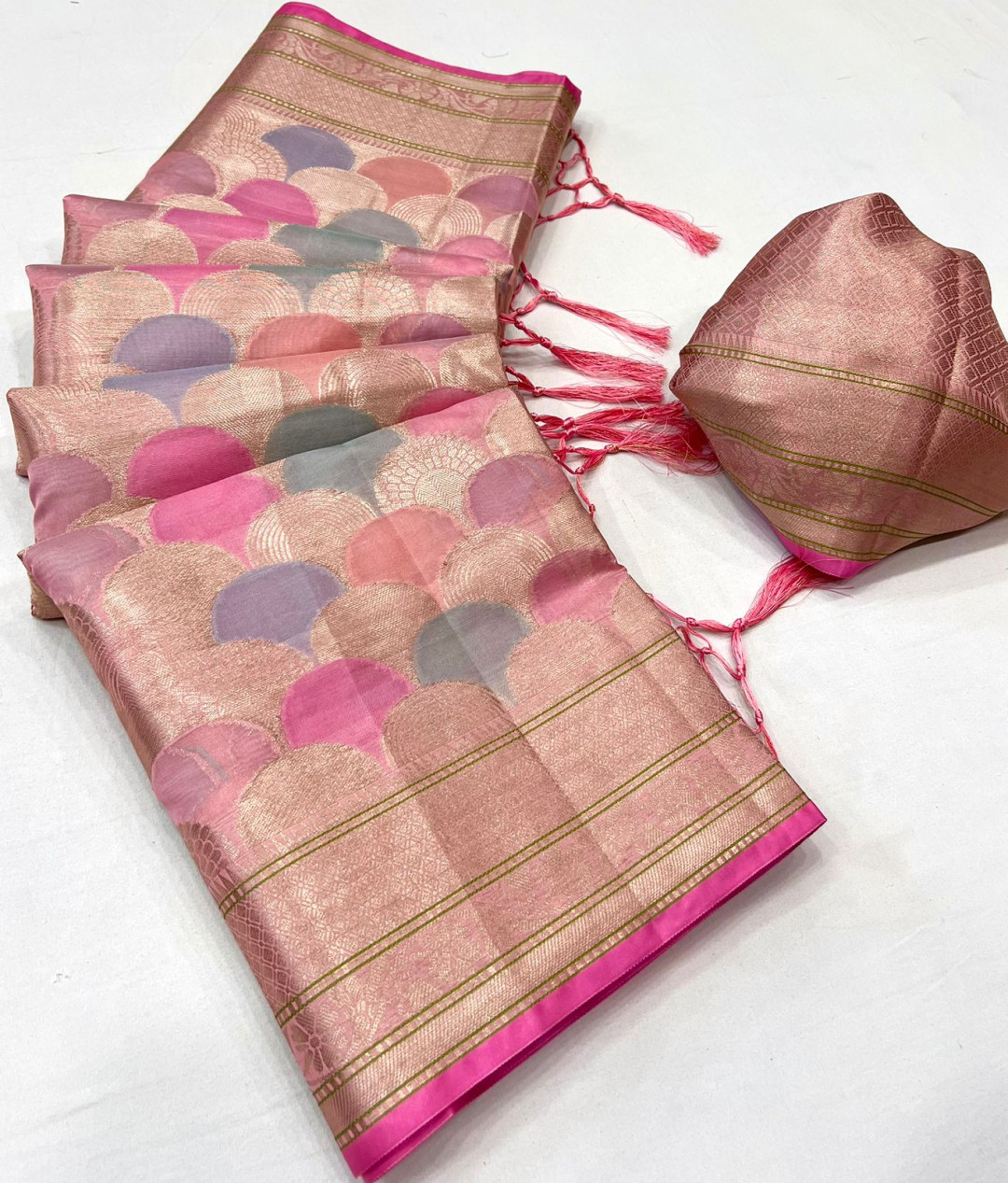Baby pink color organza silk saree with zari weaving work
