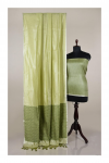 Lime green color metallic linen saree with silver zari border