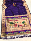 Violet color paithani silk saree with golden zari weaving work
