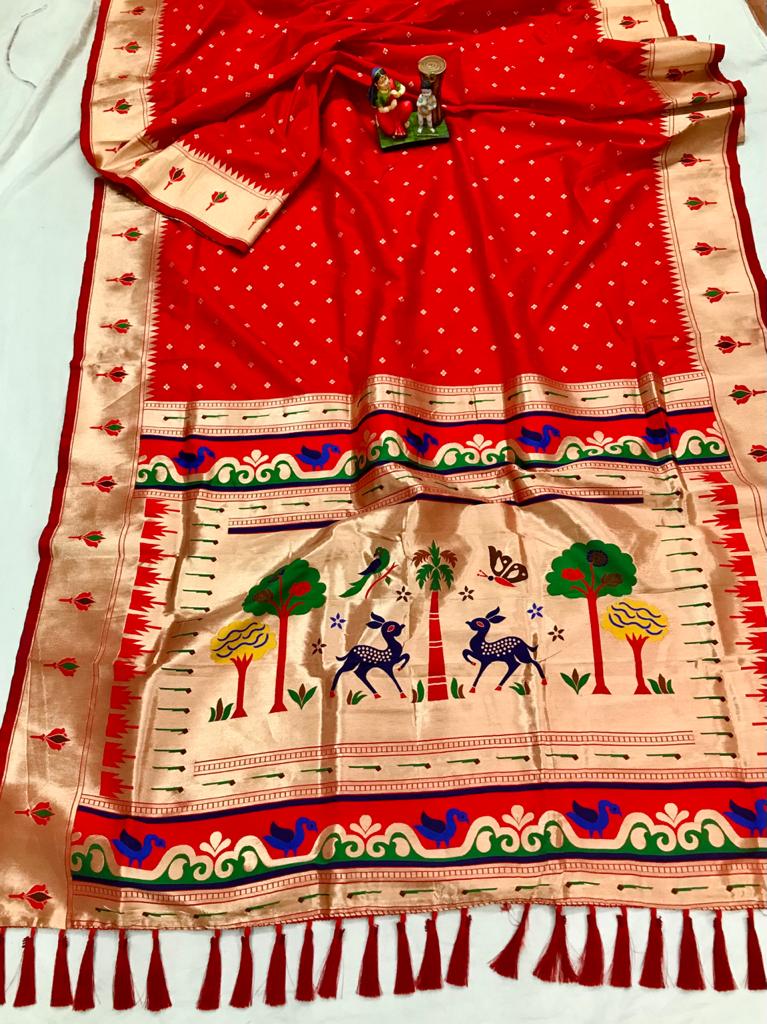 Red color paithani silk saree with golden zari weaving work