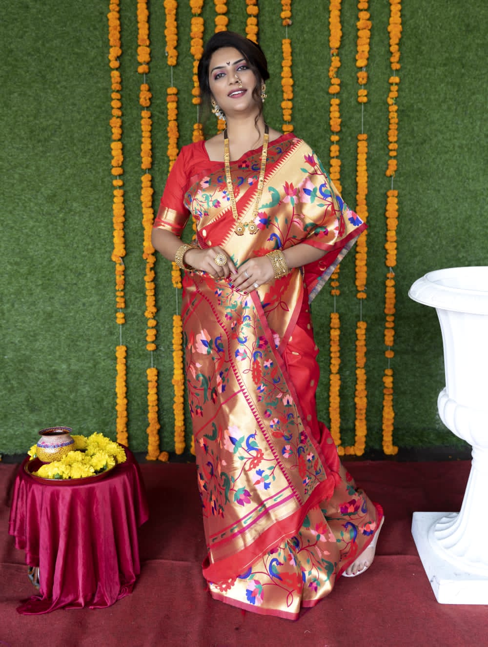 Red color paithani silk saree with zari weaving work