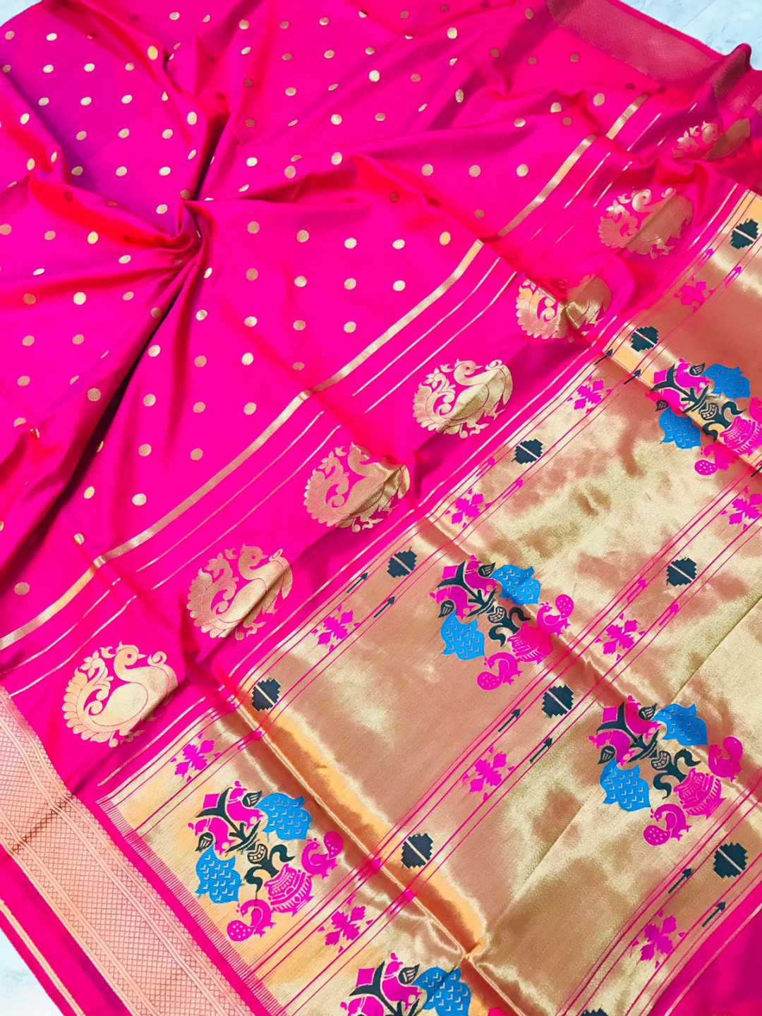 Pink color kanchipuram silk saree with golden zari weaving work