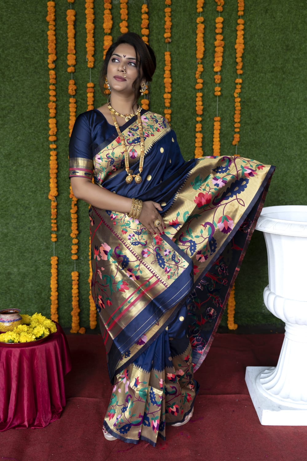 Navy blue color paithani silk saree with zari weaving work