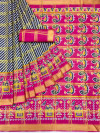 Rani pink and blue color patola silk saree with printed work