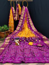 Orange and purple color soft bandhani silk  saree with khadi printed work