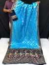 Sky blue color dola silk saree with zari woven work
