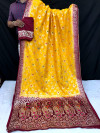 Yellow color dola silk saree with zari woven work