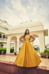 Mustard yellow color cotton gown with sequince embroidered work