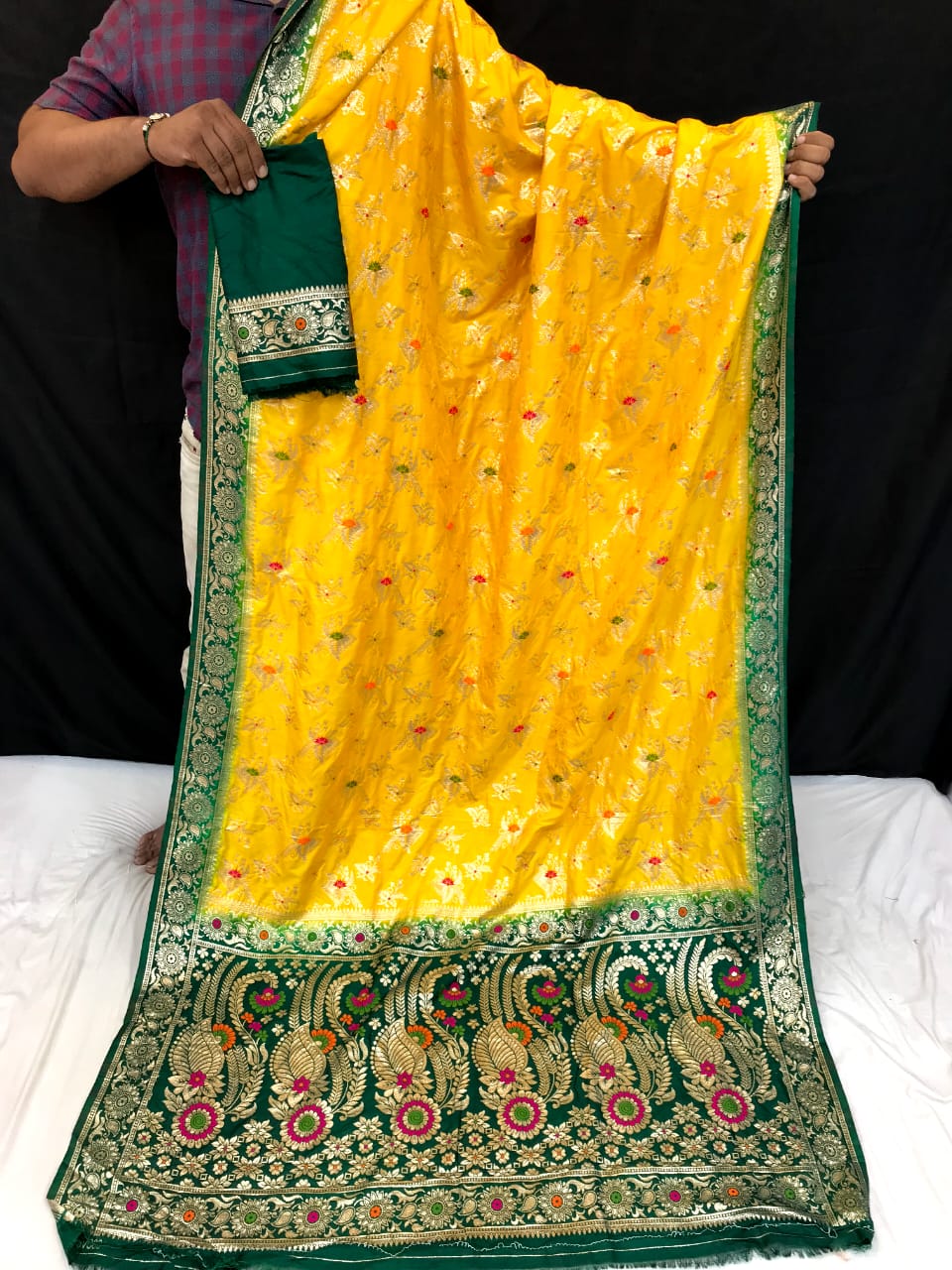 Yellow color dola silk saree with zari woven work