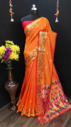 Orange color paithani silk saree with weaving pallu