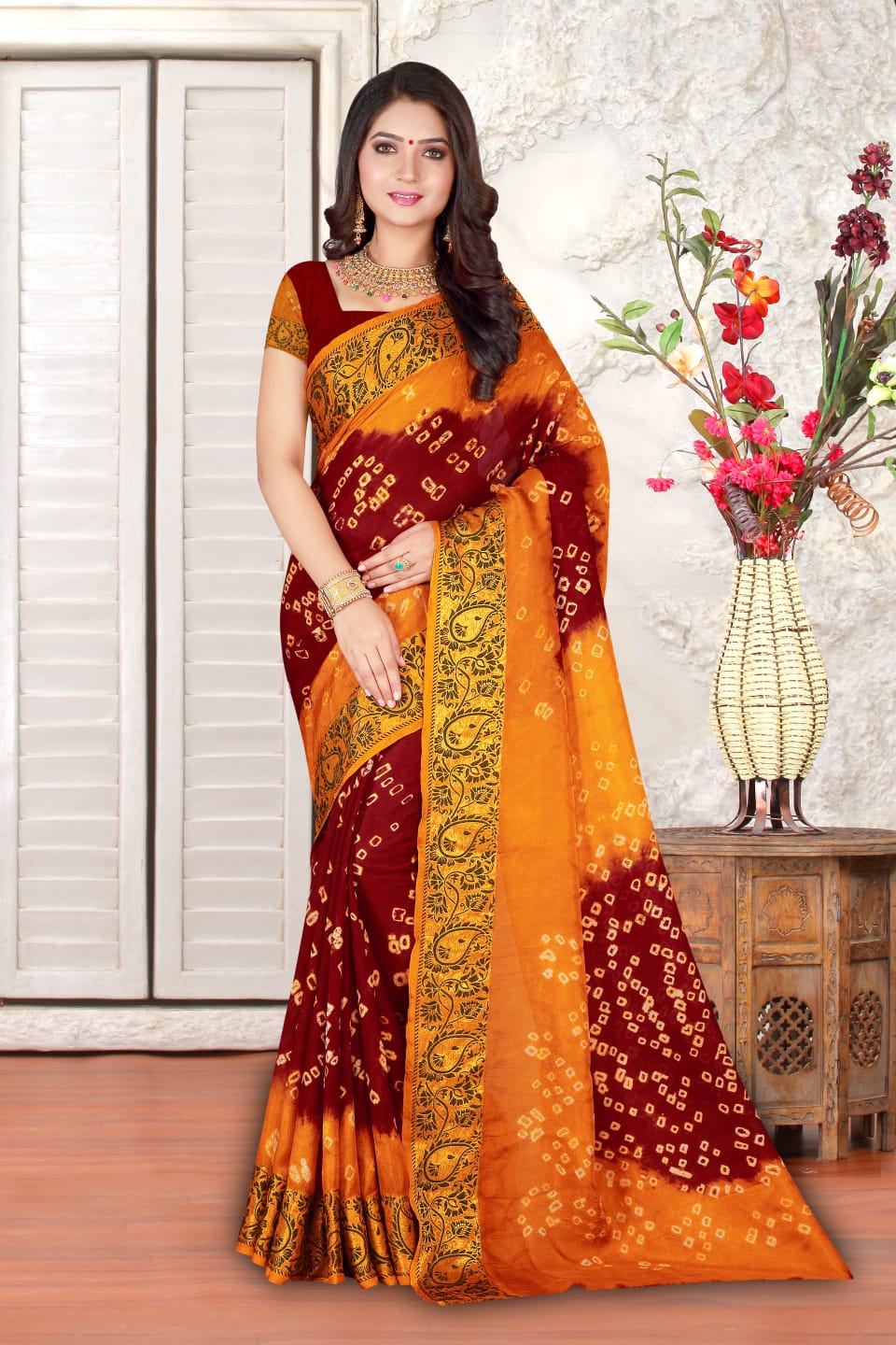 Maroon and orange color hand bandhej bandhani saree