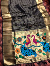 Black color paithani silk saree with attractive pallu